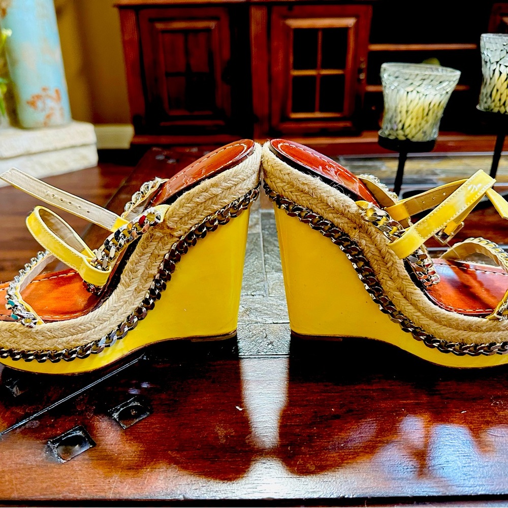 Christian Louboutin wedge, girly, fun and flexible.